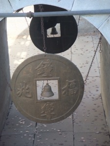 hit the bell with a coin and get your wish...